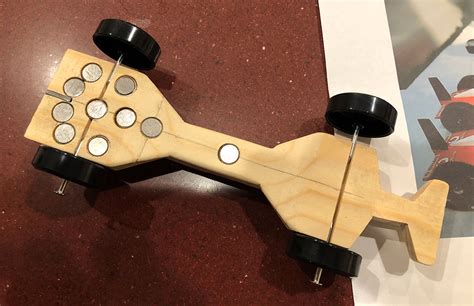 How to Add Weight to Pinewood Derby Car: A Journey Through Physics and Creativity